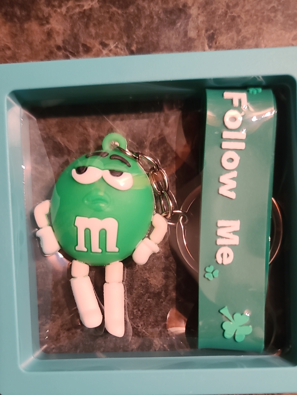 M&M'S Green Character Keychain with Teal 'Follow Me' Strap
